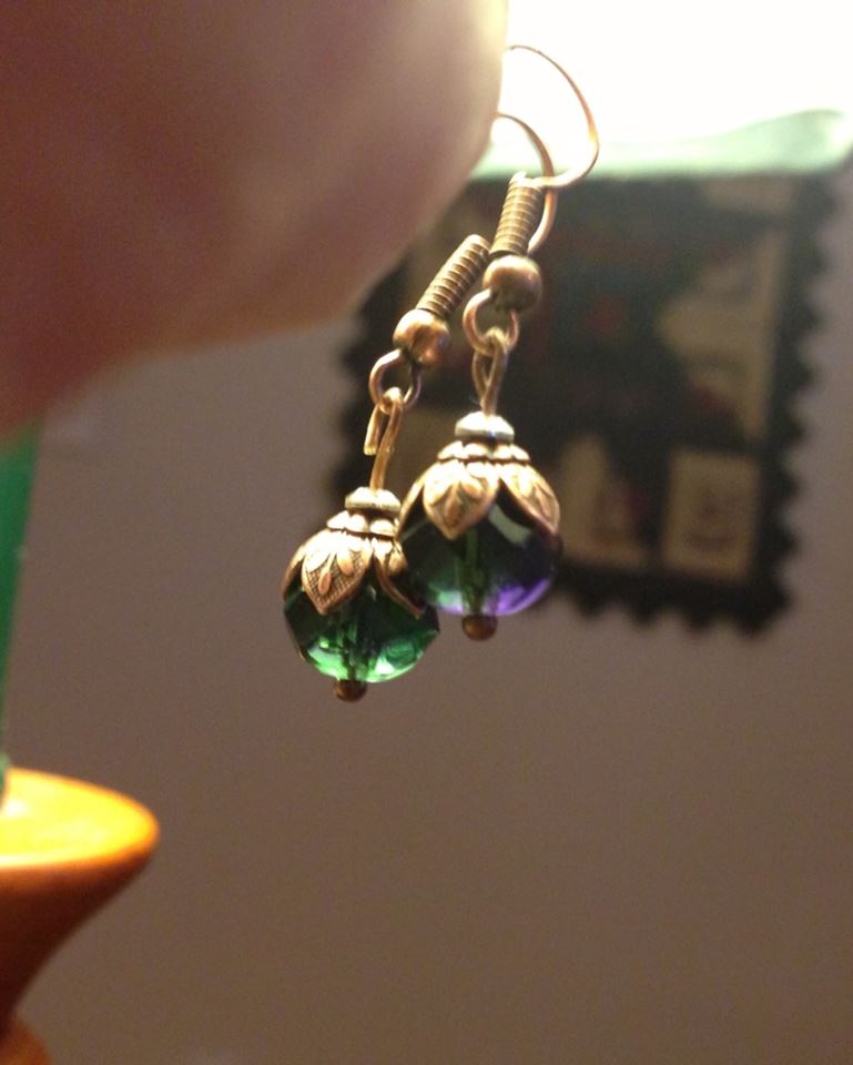green and purple earrings